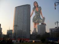 giantess collage city mega destruction brunette wonderslug looking_at_viewer leaning_on_building adelaide_kane