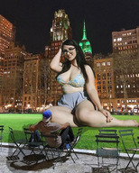 breasts giantess collage city mega black_hair large_breasts long_hair cleavage buildings glasses sitting kneeling night outdoors new_york_city crowds empire_state_building thick_thighs