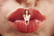 collage long_hair cleavage huge_breasts red_hair unknown_artist shrunken_woman necklace between_lips pursed_lips
