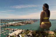 giantess collage city black_hair long_hair buildings smiling looking_down boats outdoors hoop_earrings big_butt tekitocreations