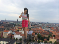 giantess collage city long_hair clothed buildings brunette looking_down outdoors