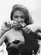 giantess collage monochrome clothed handheld shrunken_man cruel edison cave_woman leopard_print cave_woman_outfit