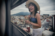 giantess collage city black_hair long_hair clothed smiling laughing outdoors kyoujingirls