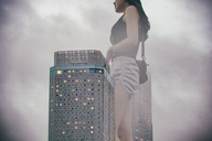 collage city long_hair buildings walking outdoors giantesss kyoujingirls