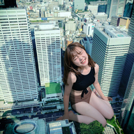 giantess collage city long_hair barefoot buildings brunette sitting outdoors closed_eyes clenched_teeth kyoujingirls