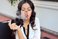 collage color long_hair clothed brunette unknown_artist sitting smoking blowjob shrunken_man lipstick cigarette hanging_on source_needed makeup
