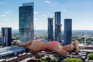 bikini giantess collage city mega blonde color barefoot buildings smiling lying_down unknown_artist clouds outdoors sky manhattan looking_at_viewer new_york_city source_needed bare_butt bare_legs bare_midriff bare_thighs contstruction construction_sity