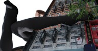 giantess city buildings stockings socks sitting legs outdoors sky long_socks sitting_on_building black_socks velocity-vektor