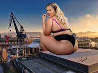 giantess collage city mega blonde color long_hair buildings sitting clouds outdoors sky looking_back looking_at_viewer semi_nude sitting_on_building rear_view bare_legs tekitocreations bare_thighs ludi_holanda