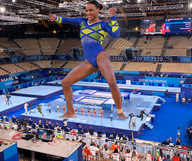 giantess collage black_hair color barefoot smiling short_hair tokyo indoors hair_bun bare_legs zebos2003 bare_thighs olympic_games rebeca_andrade
