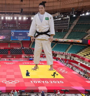 giantess collage black_hair color clothed barefoot stadium short_hair tokyo indoors hair_bun zebos2003 olympic_games budokan mayra_aguiar