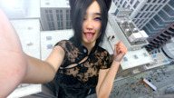 giantess city mega black_hair color blue_eyes clothed buildings high_angle smiling short_hair hand looking_up outdoors freckles aerial_view point_of_view looking_at_viewer digital_render one_eye_covered sticking_out_tongue