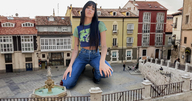 gentle giantess collage black_hair long_hair clothed jeans onlookers tattoo fountain plaza bare_midriff