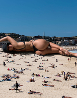 bikini giantess collage butt beach barefoot lying_down onlookers bucket_hat