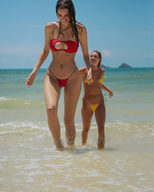 bikini gentle collage blonde black_hair long_hair beach ocean wet mini_giantess thong walking wading