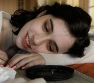 giantess collage black_hair lying_down shrunken_man looking_down pink_nails staring resting indoors curly_hair necklace daski