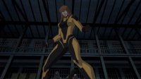 breasts giantess mega black_hair color large_breasts long_hair giganta gloves cartoon towering indoors fist costume wonder_woman jumpsuit orange_hair dc_comics looking_at_tinies warehouse