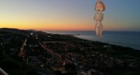 breasts giantess collage nude pussy mega beach cleavage water ocean buildings red_hair short_hair unknown_artist town family_guy thighs sunset milf earrings lois_griffin source_needed wading