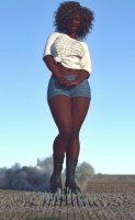 breasts giantess giga city mega black_hair large_breasts destruction buildings story short_hair boots shorts looking_down dark_skin smoke thighs digital_render jeanshorts bare_legs bare_midriff allthesizepuns