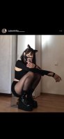 breasts collage black_hair long_hair shoes cat_ears stockings pet asian unknown_artist sitting phone shorts shrunken_man cage mask indoors source_needed