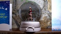 breasts long_hair butt barefoot bra brunette christmas shorts shrunken_woman trapped snow avengers thighs bench hands_on_hips snowglobe digital_render christmas_card bare_legs marvel_comics scarlet_witch bare_midriff santa_suit bare-faced-cheek