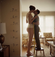 enhanced_art gentle butt brunette kissing amazon standing size_comparison living_room top measuring stool measuring_tape ai_art