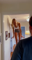 gentle blonde long_hair clothed mini_giantess shorts bending_over top apartment ai_art giantesshug