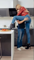 gentle blonde long_hair clothed high_heels jeans boots amazon kitchen hugging standing jacket ai_art elevated_humor