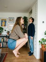 gentle long_hair clothed barefoot mini_giantess shorts standing size_comparison crouching apartment ai_art