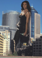 breasts giantess collage mega story megagiantess gtsmakerdj claudia_black handheld top looking_at_viewer leaning_on_building holding_building Mega Megagiantess farscape aeryn_sun