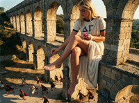 breasts mega blonde barefoot sitting nail_polish crowds running_away legs_crossed toga bare_legs roman Mega aqueduct giantess ai_art