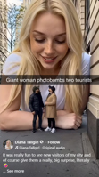breasts phone gentle giantess blonde clothed smiling street lying_down looking_down freckles new_york_city tshirt ai_art Ai_art coats