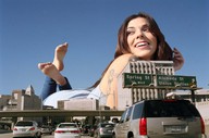 gentle giantess city barefoot soles brunette face vehicles tattoo