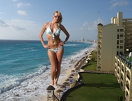 gentle giantess blonde swimsuit beach water pacmanri