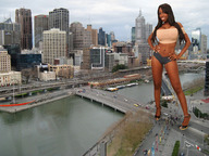 breasts giantess collage city mega long_hair smiling unknown_artist shorts skyscraper people standing river vehicles dark_skin top looking_at_viewer hands_on_hips melbourne