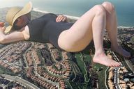 giantess feet mega swimsuit destruction beach one_piece barefoot lying_down legs foot_print sunglasses houses hat one_piece_swimsuit