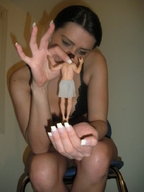 gentle collage handheld shrunken_men hand dangle kristina between_fingers looking_at_tiny