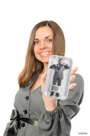 giantess long_hair handheld green_eyes smiling shrunken_men entrapment business_woman business_man captured_prisoner