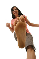 feet black_hair soles shorts cruel fist point_of_view