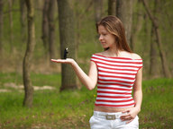 collage long_hair clothed handheld brunette shrunken_men outdoors trees