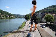 giantess large_breasts clothed high_heels brunette legs vehicles