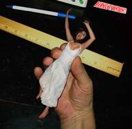 collage handheld barefoot scared hand shrunken_woman pen captured ruler desk white_dress