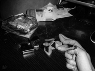 collage monochrome finger scared hand shrunken_woman captured swattr cigarette desk