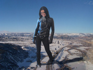 giantess collage black_hair clothed helicopter jeans smiling gloves wonderslug looking_down foot_print snow leather kristina