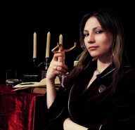 collage handheld brunette shrunken_men robe rings book shrink_spell candles