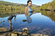 breasts nipples giantess black_hair swimsuit cleavage wet lake reflection kelly_brook photographer