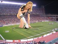 giantess blonde smiling stadium socks kneeling giantess_daisy crowds football_pitch referee