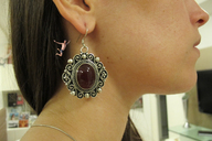 collage unaware shrunken_man ear jumping earrings encolhido