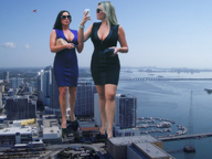 giantess collage city mega blonde black_hair cleavage high_heels legs airplane sunglasses giantesses business_woman