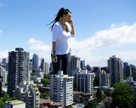 collage city mega black_hair clothed vehicles sky sunny tattoo between_fingers
